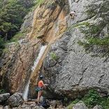 climbing by the waterfall